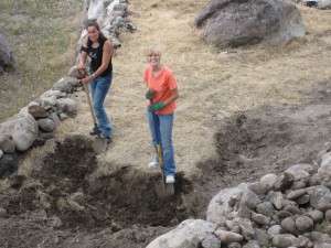 Sonja and Jeanette trying to dig rocks out