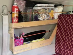 This shelf unit for the passenger side by the back seat is now full of all those things you need easy access to.